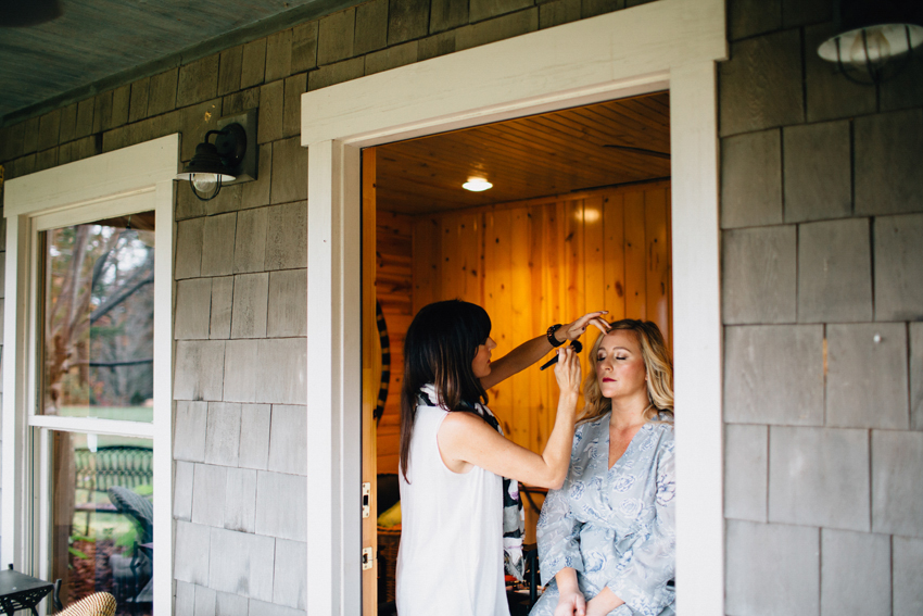 Bride getting makeup done for the outdoor ceremony at Splendor Mountain in Georgia