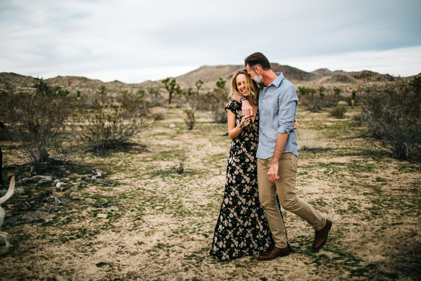 Adorable couple walking candid engagement photos