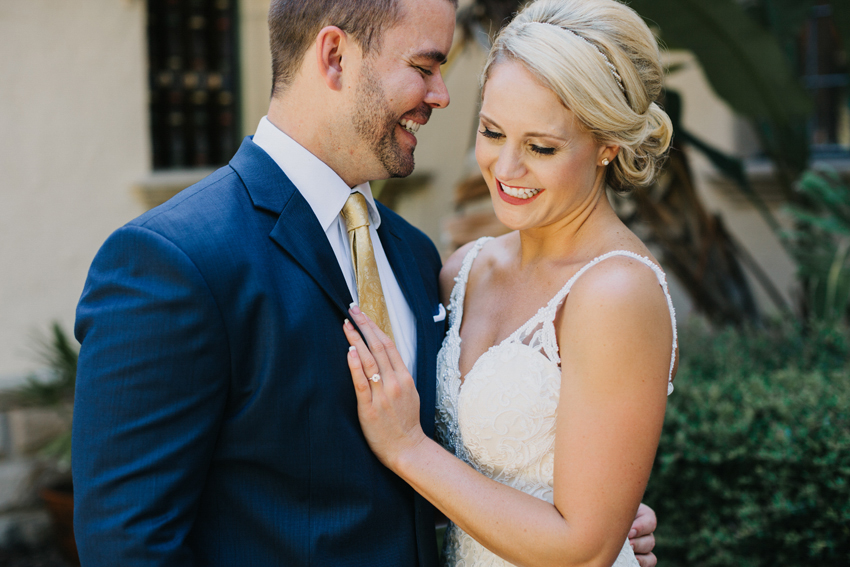 Sweet couple laughing on their wedding day at the historic mansion at Powel Crosley Estate