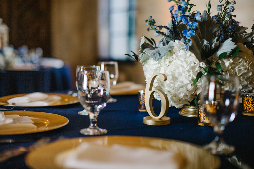 Navy and gold wedding centerpieces