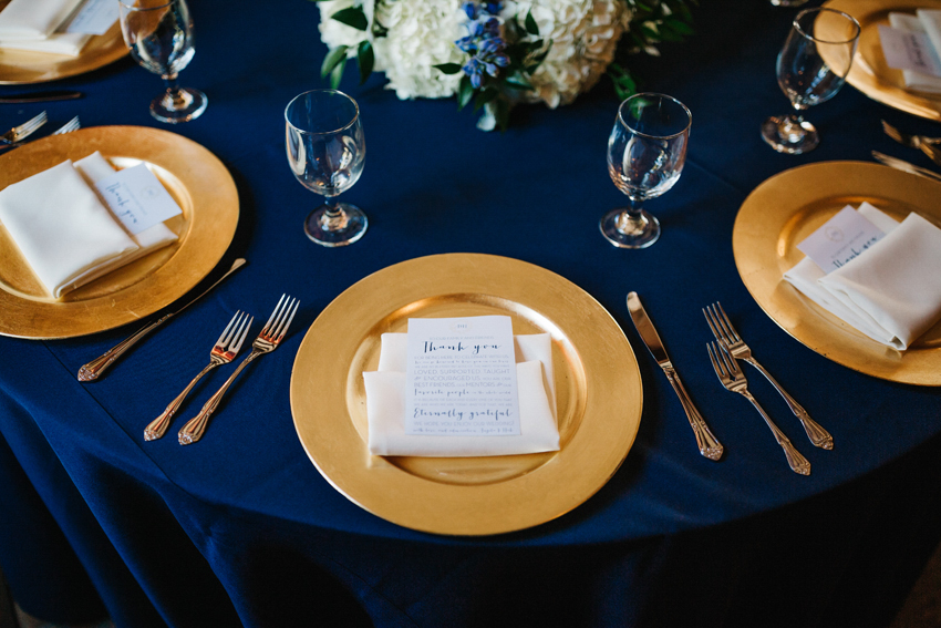 gold chargers and menus for wedding placesettings
