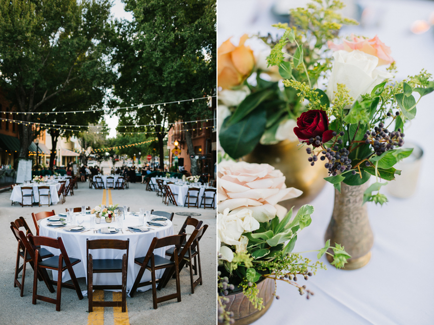 Modern romantic outdoor wedding reception in the streets of downtown Lakeland designed by Ashton Events with twinkle lights and lush florals and greenery