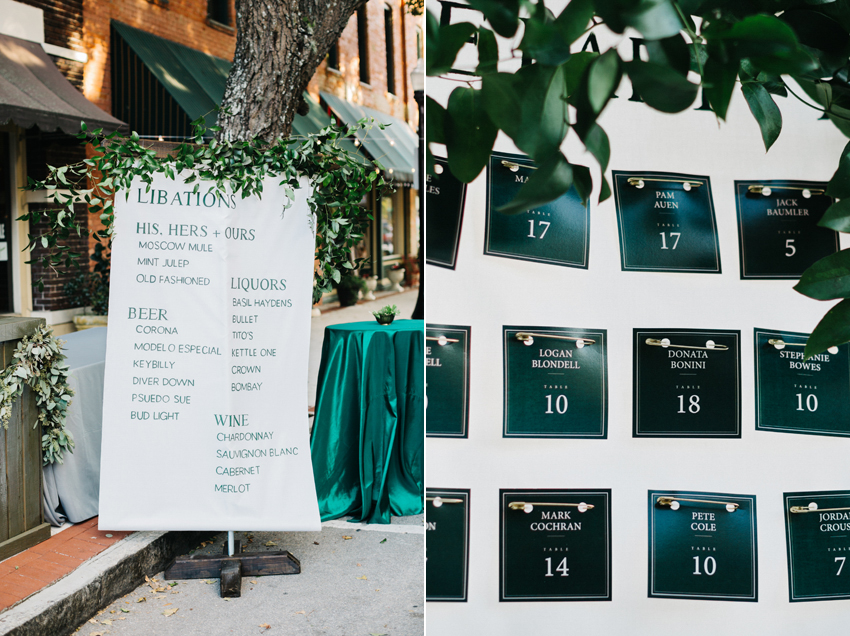 Customized emerald green placecards with greener and hand painted bar menu on a canvas with garland