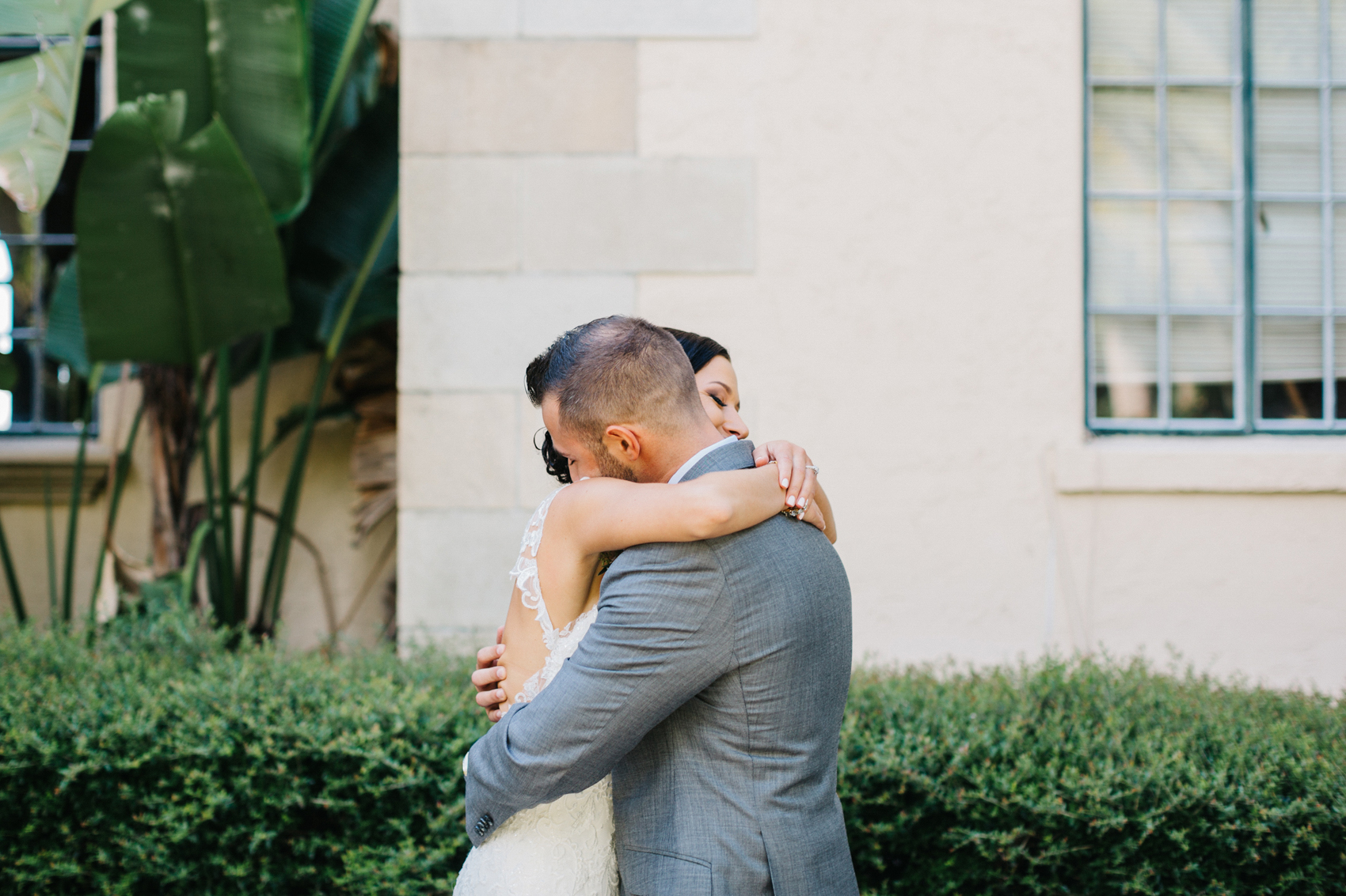A sweet first look before the outdoor Sarasota wedding