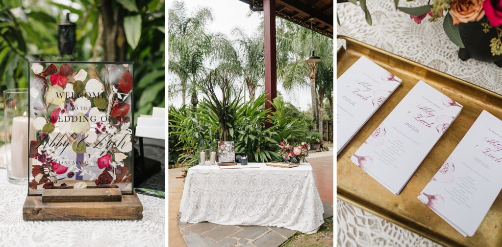 Boho plum and burgundy guestbook table with custom flower petal sign