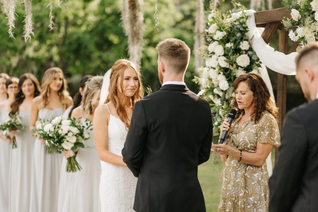 Outdoor ceremony under the oak tree at The Mulberry