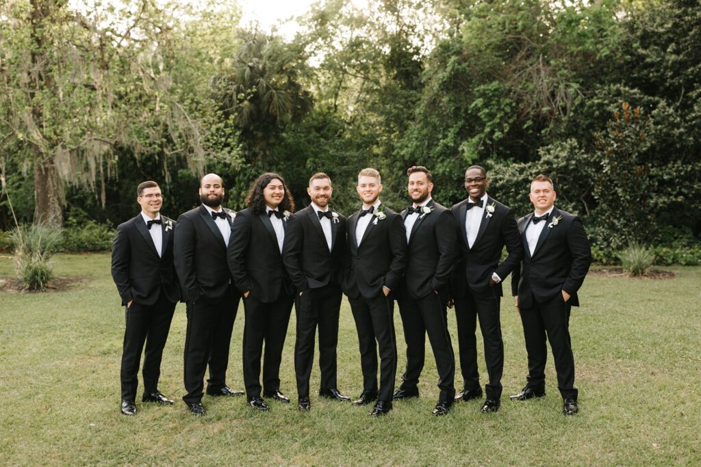 groomsmen wearing black tuxes at The Mulberry
