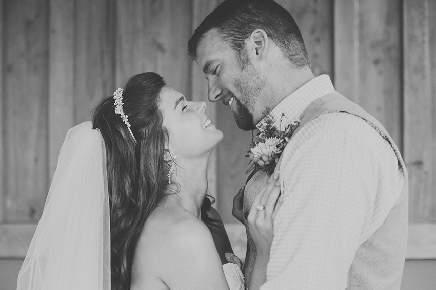 Bride and groom at a rustic barn wedding at Sweetfields Farm in Florida