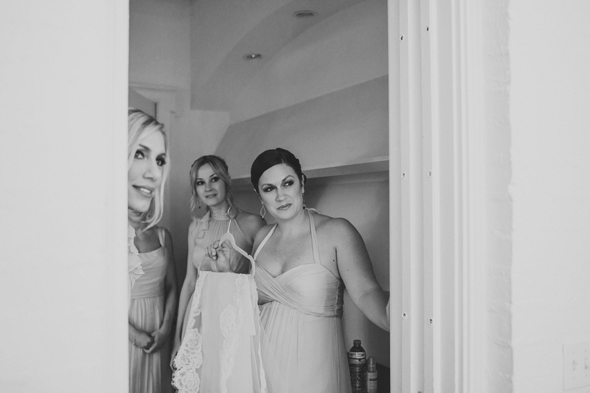 bridesmaids first look with the bride at Marie Selby Gardens