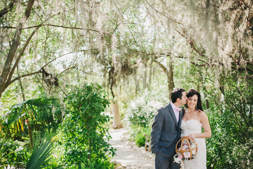 First look in the garden with the bride and groom at Marie Selby Gardens
