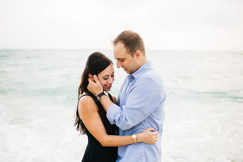 Rocky beach engagement session in Sarasota