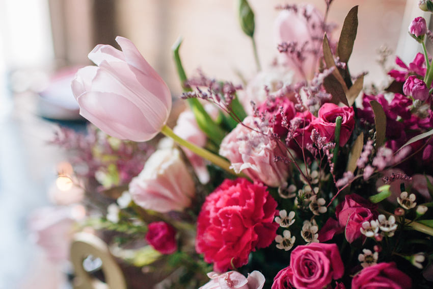 Loose wedding bouquet with pink tulips and wildflowers