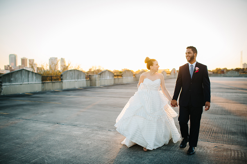 Downtown Tampa wedding photography on a rooftop with the skyline in the background at sunset