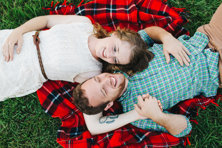 Romantic and cute engagement photos on a picnic blanket