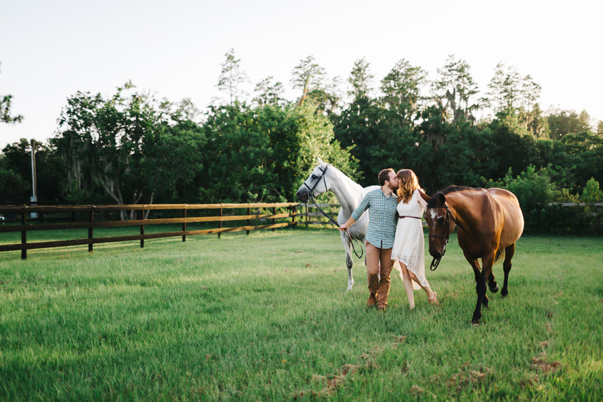 A romantic engagement session photographed at sunset on a beautiful horse farm in Tampa, Florida