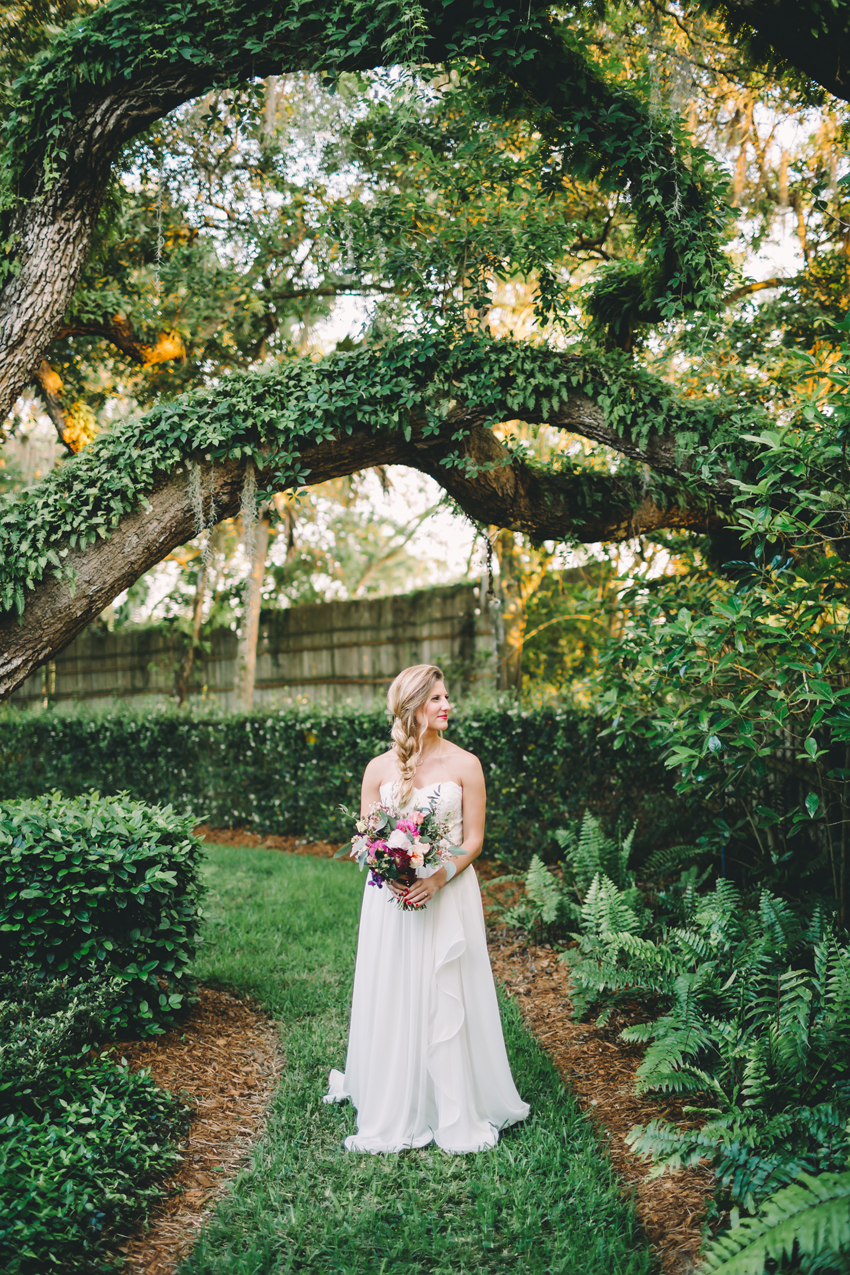 Beautiful bride at a garden wedding dressedin a Hayley Paige wedding gown from The White Magnolia in Tampa, Florida