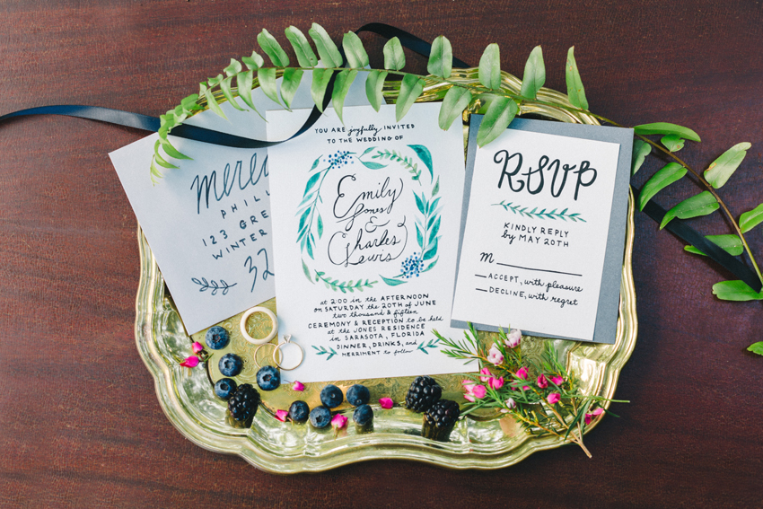 hand lettered watercolor wedding invitations with floral and leaves