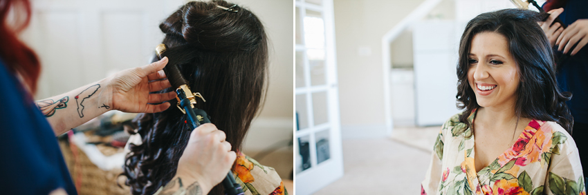 Bride getting her hair done into a romantic sidebun