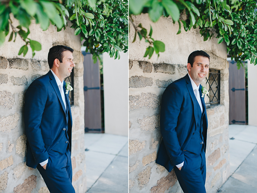 Groom wearing stylish navy suit for a St. Augustine wedding at The White Room