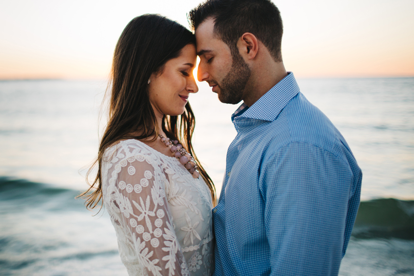 Waterfront engagement photos at sunset by St. Pete Wedding Photographer