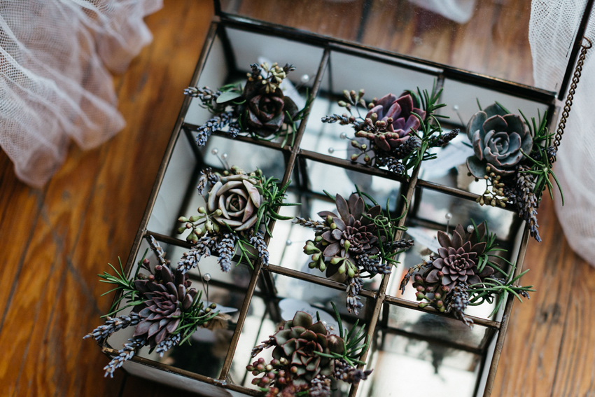 Creative and rustic mini succulent boutonnieres with fresh rosemary