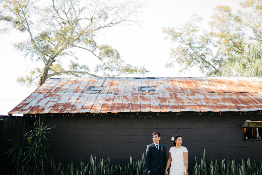 Trendy natural light wedding portraits outside at The Acre Orlando
