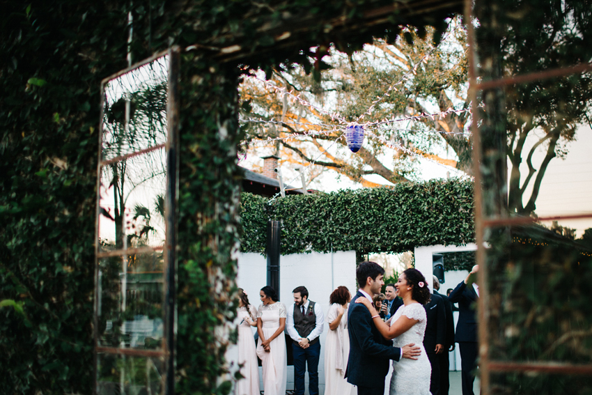 Romantic first dance in the ivy building outside at The Acre in Orlando, Florida