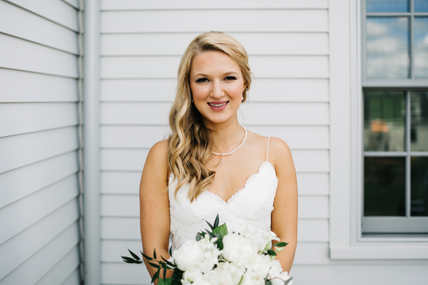 Stunning open back lace wedding gown for a coastal wedding in Newport by Renee Nicole Photography