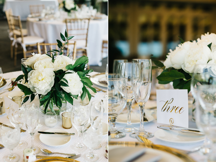 White reception decor with lush peony centerpieces and gold foil details