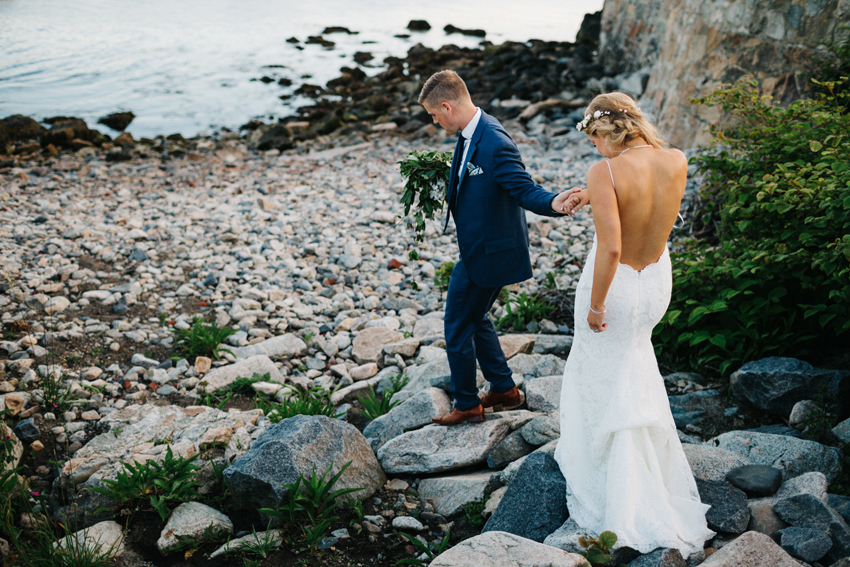 sunset wedding photos on the rocky coastal cliff walk in Newport Rhode Island