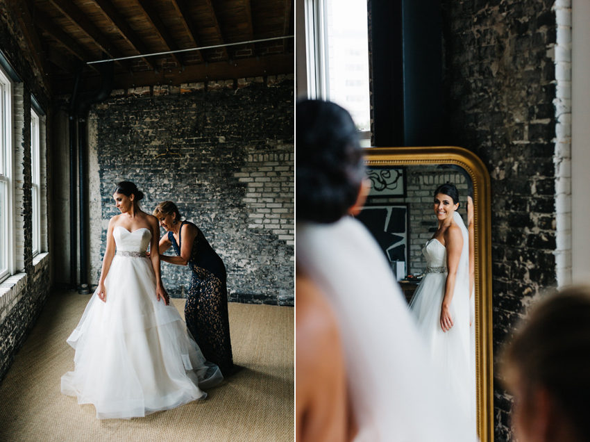 Creative wedding photos of the bride getting ready for her industrial classic wedding at The Oxford Exchange in Florida