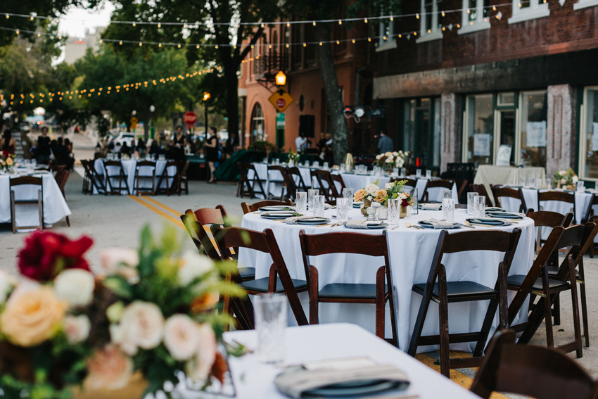Modern romantic wedding reception in the middle of the street in downtown Lakeland