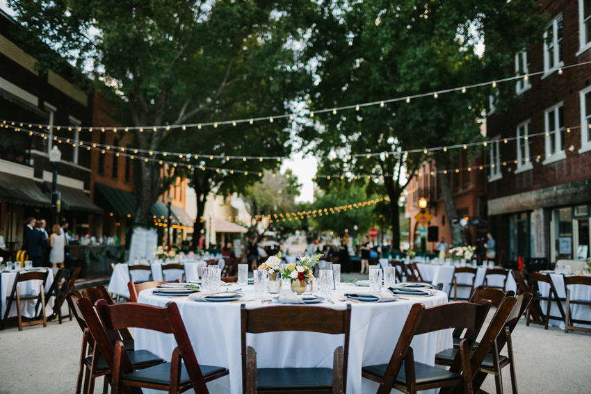 Romantic outdoor wedding reception under the twinkel lights in downtown Lakeland, Florida