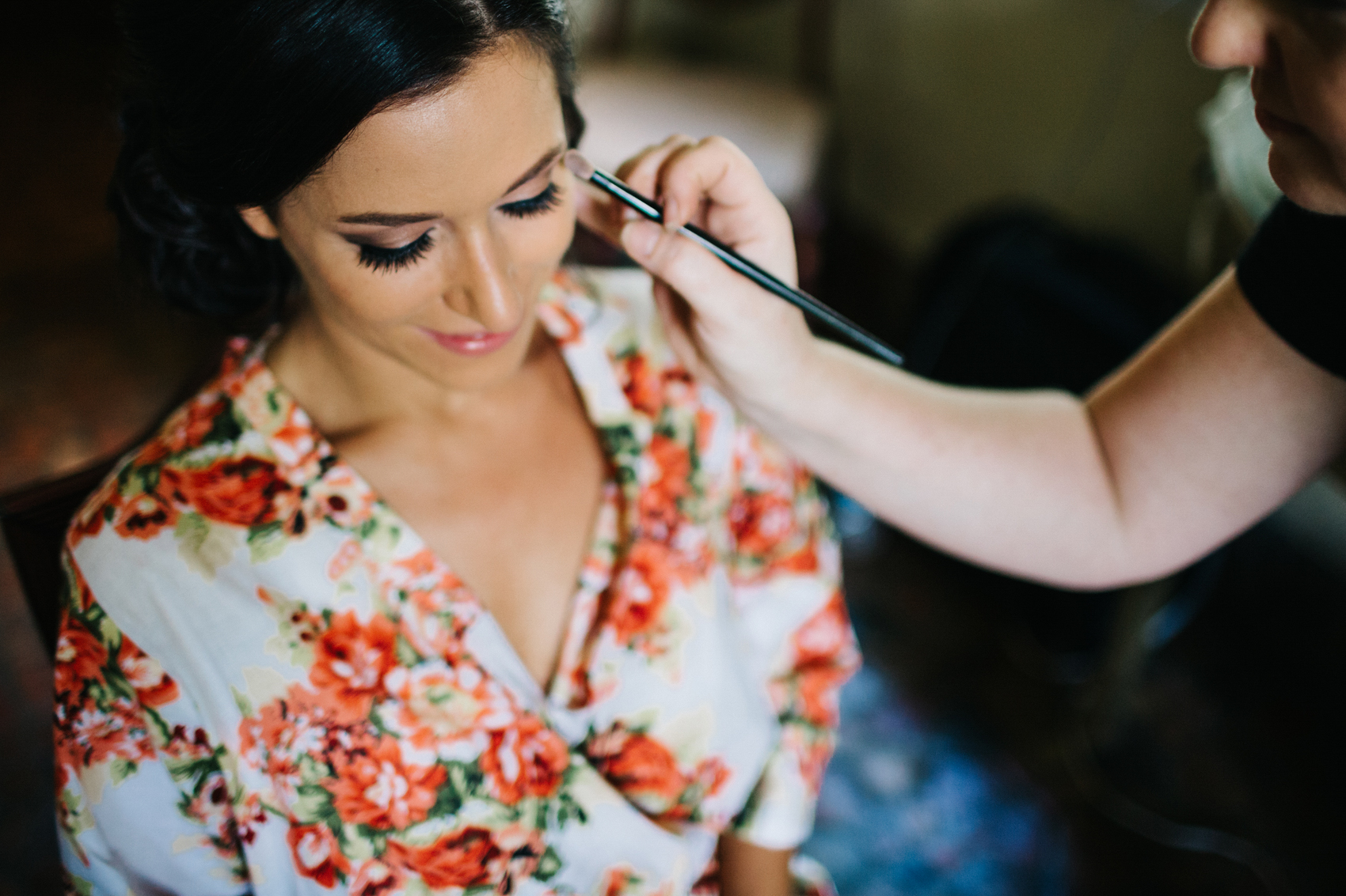 Bride getting her makeup done by Michele Renee at the Powel Crosley Garden Wedding