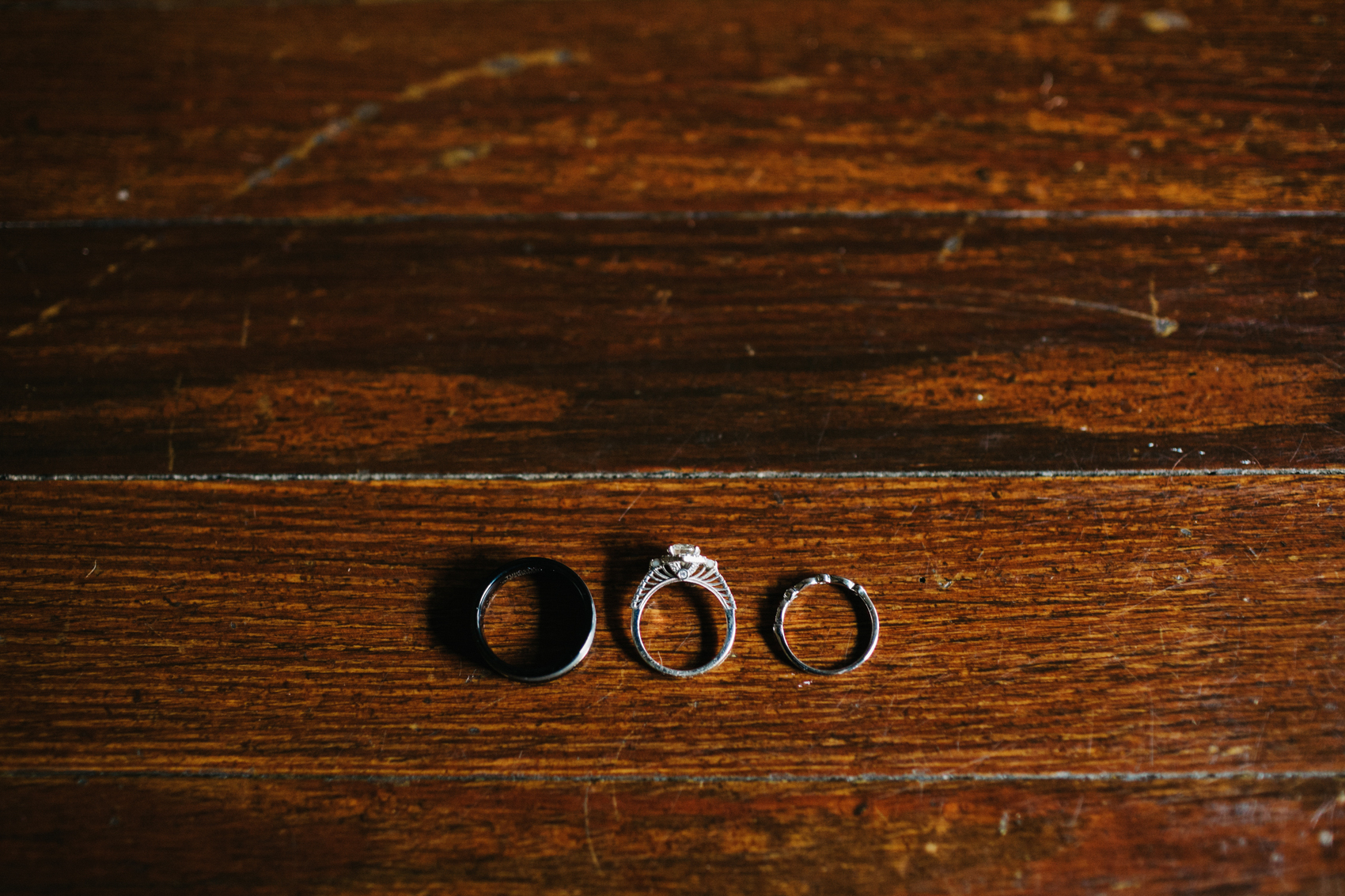 vintage wedding rings on wood