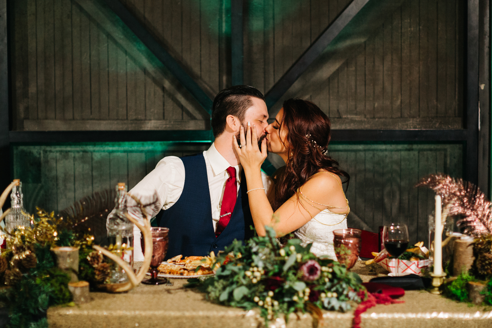 candid moment of the bride and groom kissing during the Orlando wedding reception