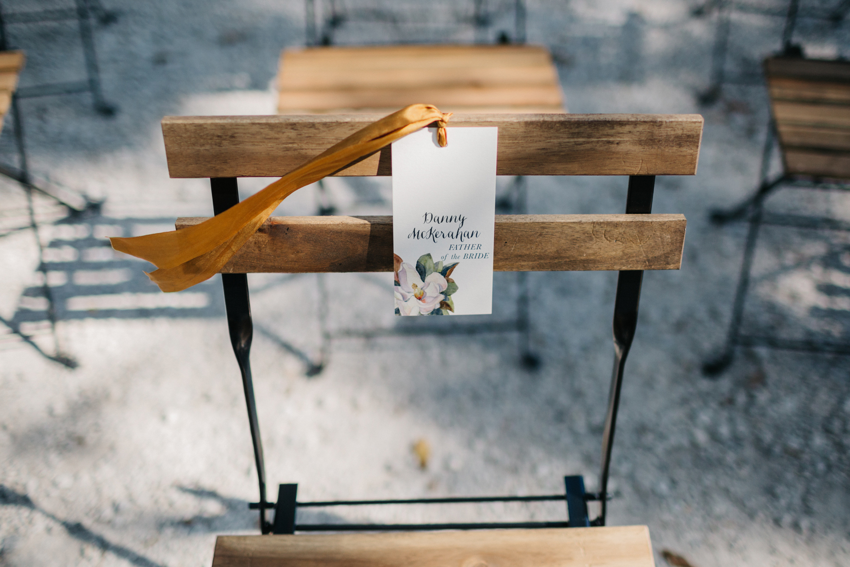 reserved seating sign at the eclectic boho garden wedding ceremony by Orlando Wedding Photographer Renee Nicole Photography