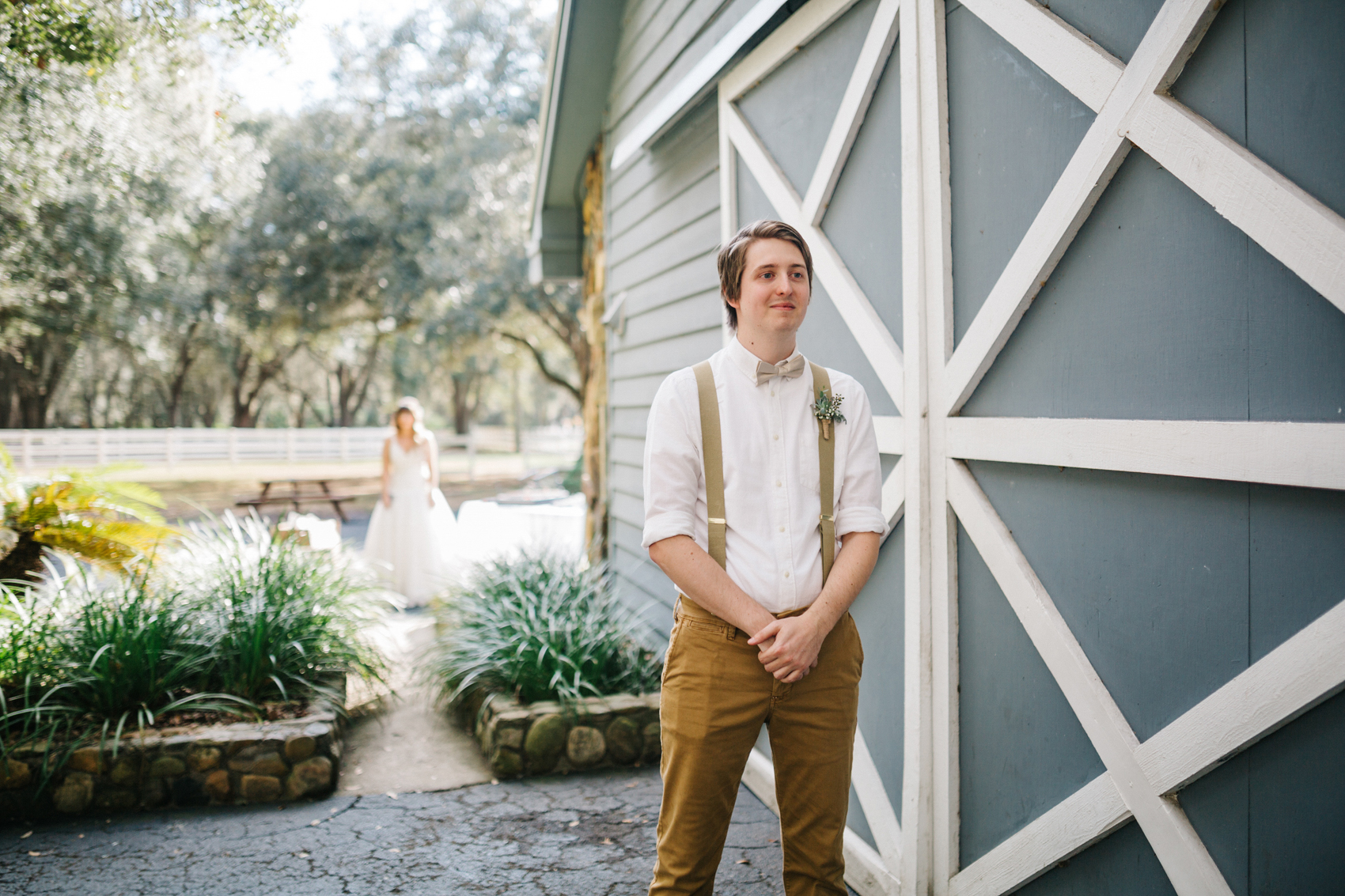 first look in front of the antique barn at the Lange Farm in Dade City, Florida