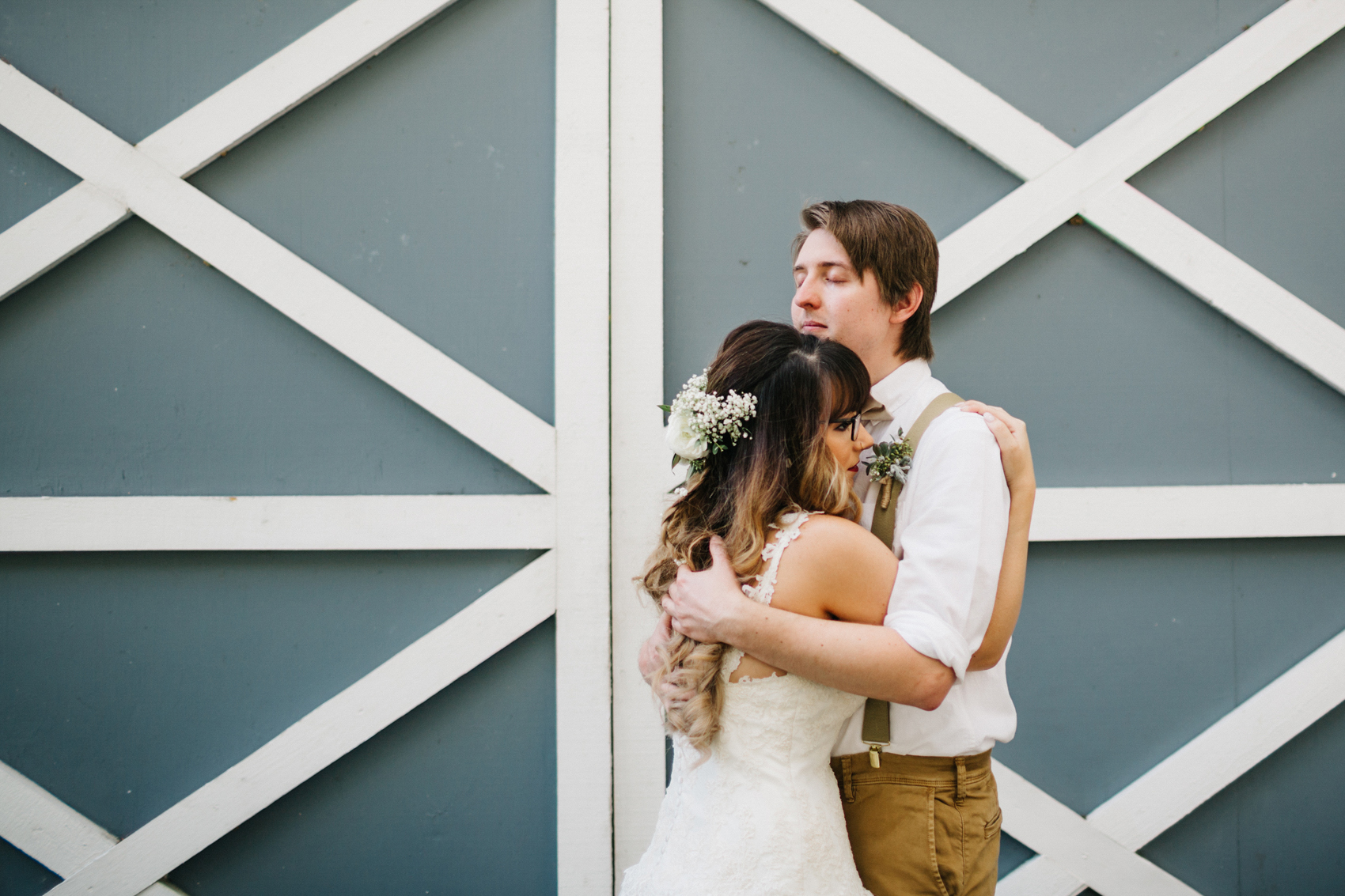 emotional first look with the bride and groom for their rustic wedding in florida