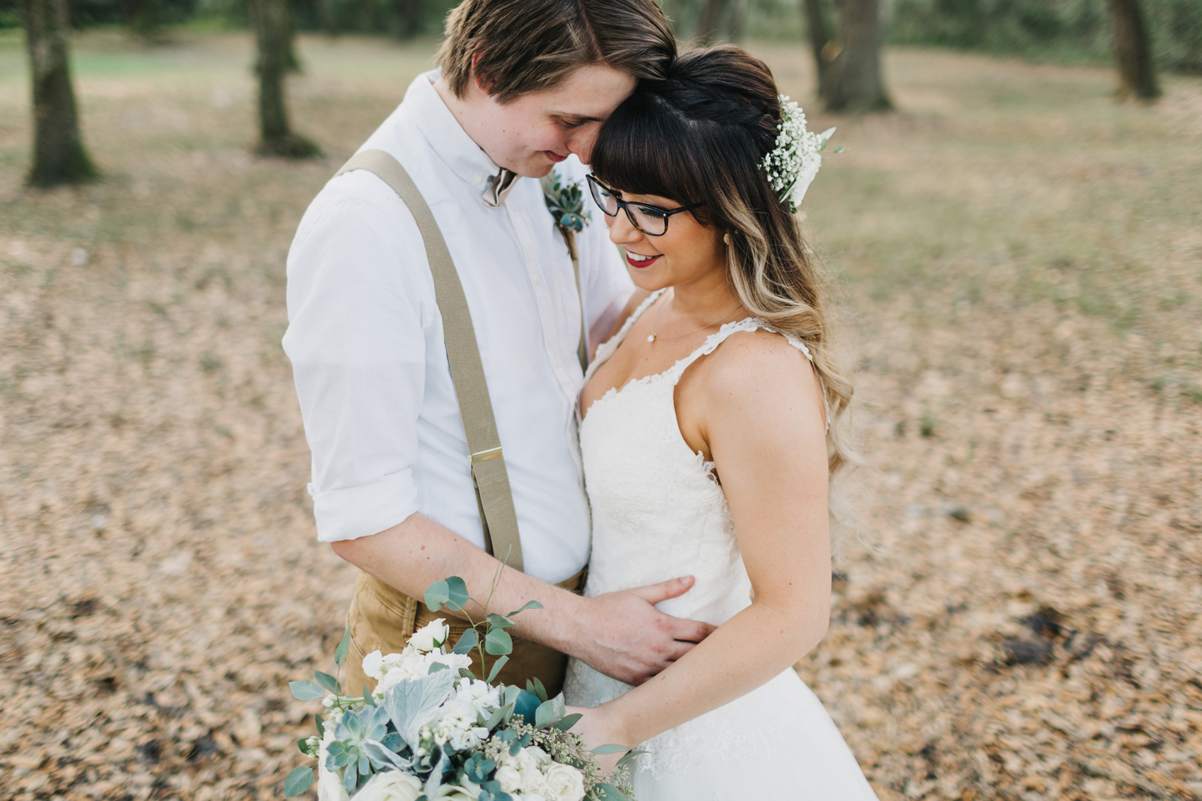 rustic romantic wedding photos in the oak trees at the lange farm