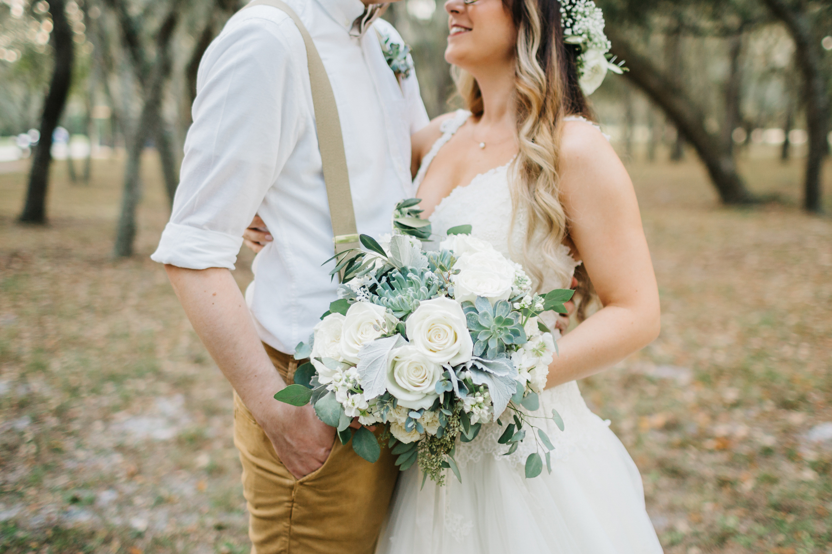 romantic rustic bouquet with succulents and loose greenery