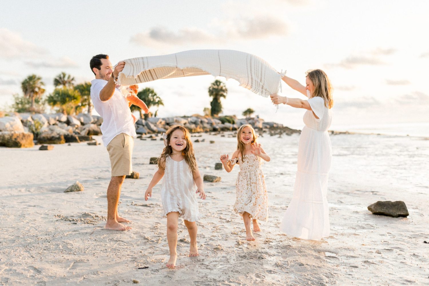 sunset family session on the beach by tampa family photographer