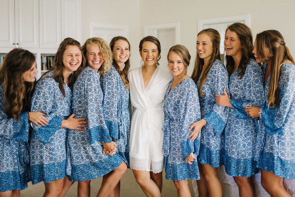 bridesmaids getting ready in matching robes
