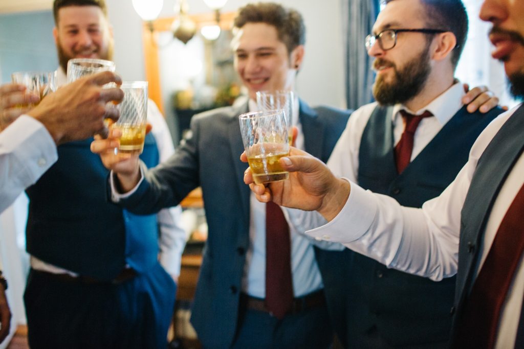 groomsmen toasting