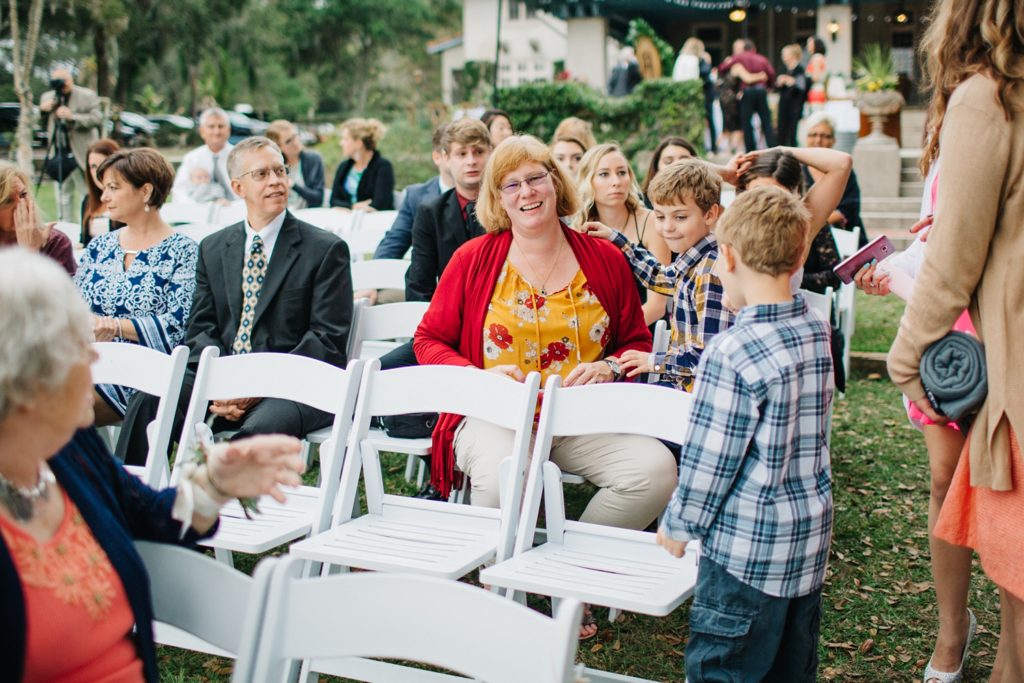 candids of the guests hanging out at the wedding ceremony
