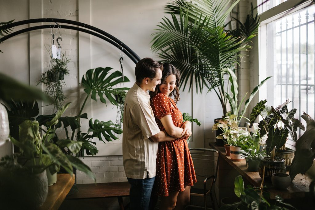 Plant shop engagement session at Fancy Free Nursery in Tampa Heights with madewell dress. 