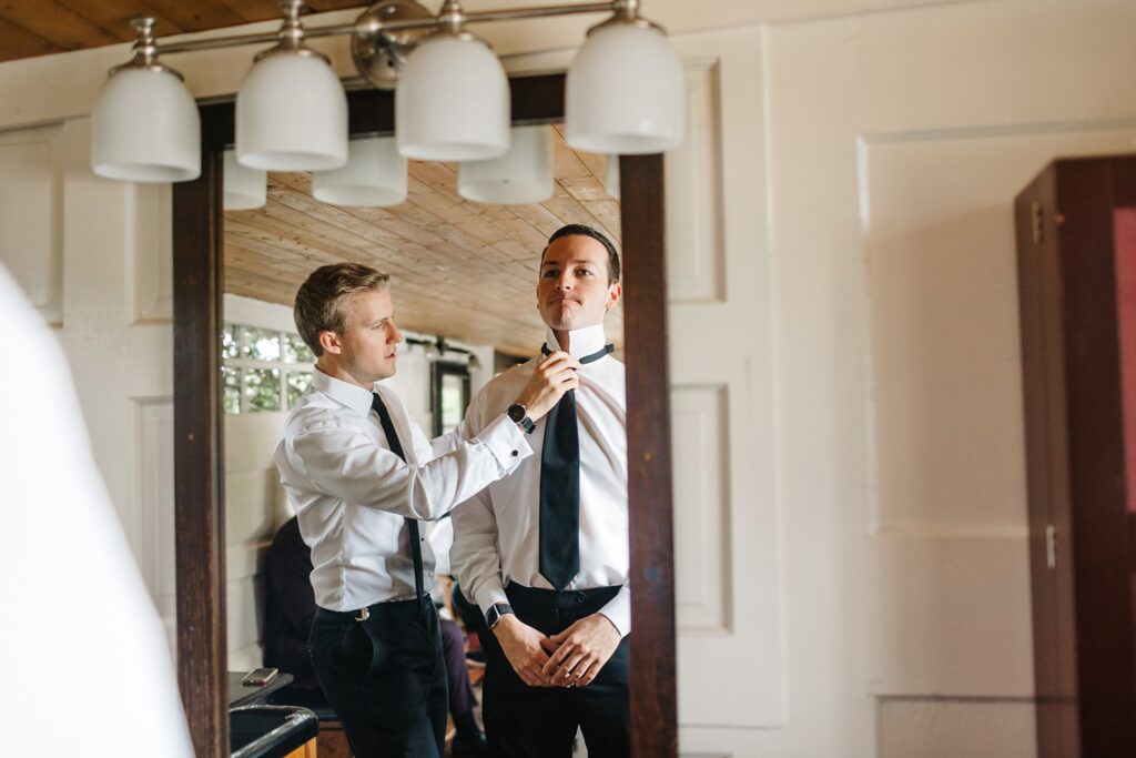 groomsmen getting ready for the ceremony