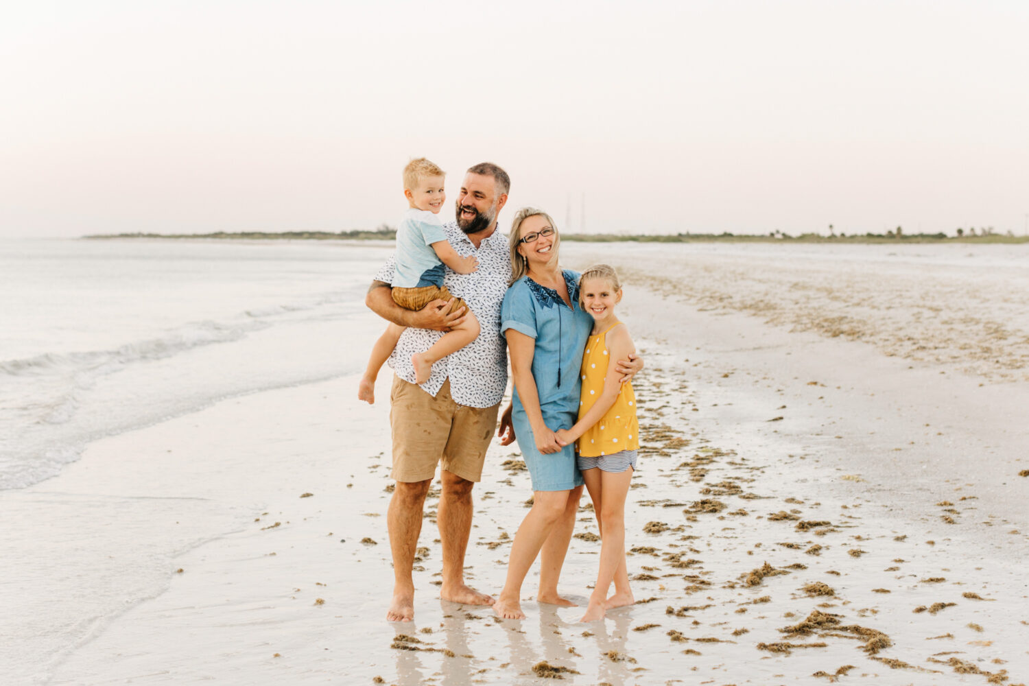 lifestyle family session on the beach at sunset