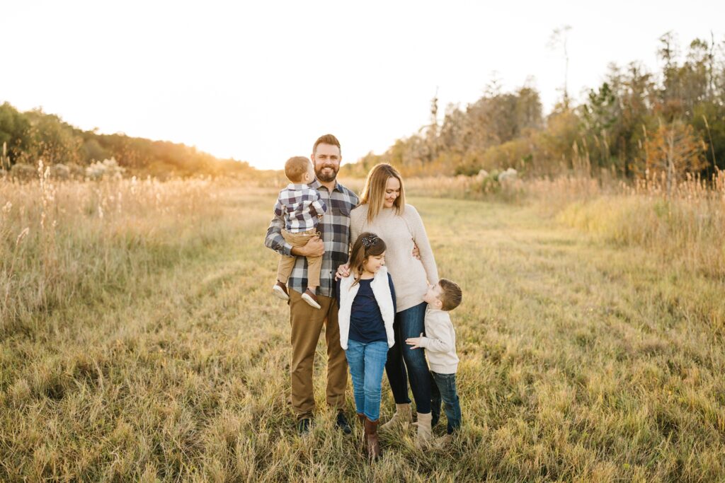 Sunset family photos in a field