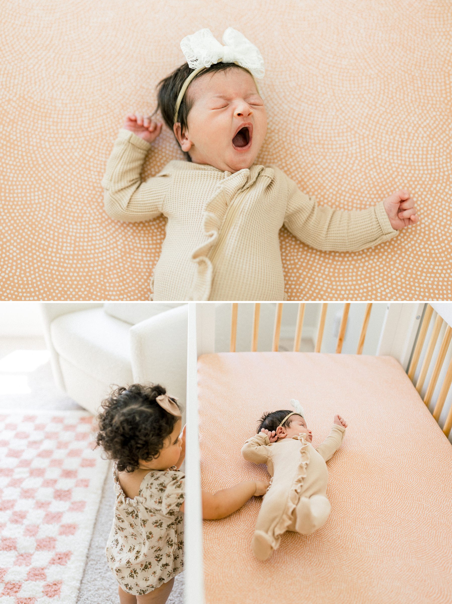 Baby yawning while big sister is reaching for her in the crib